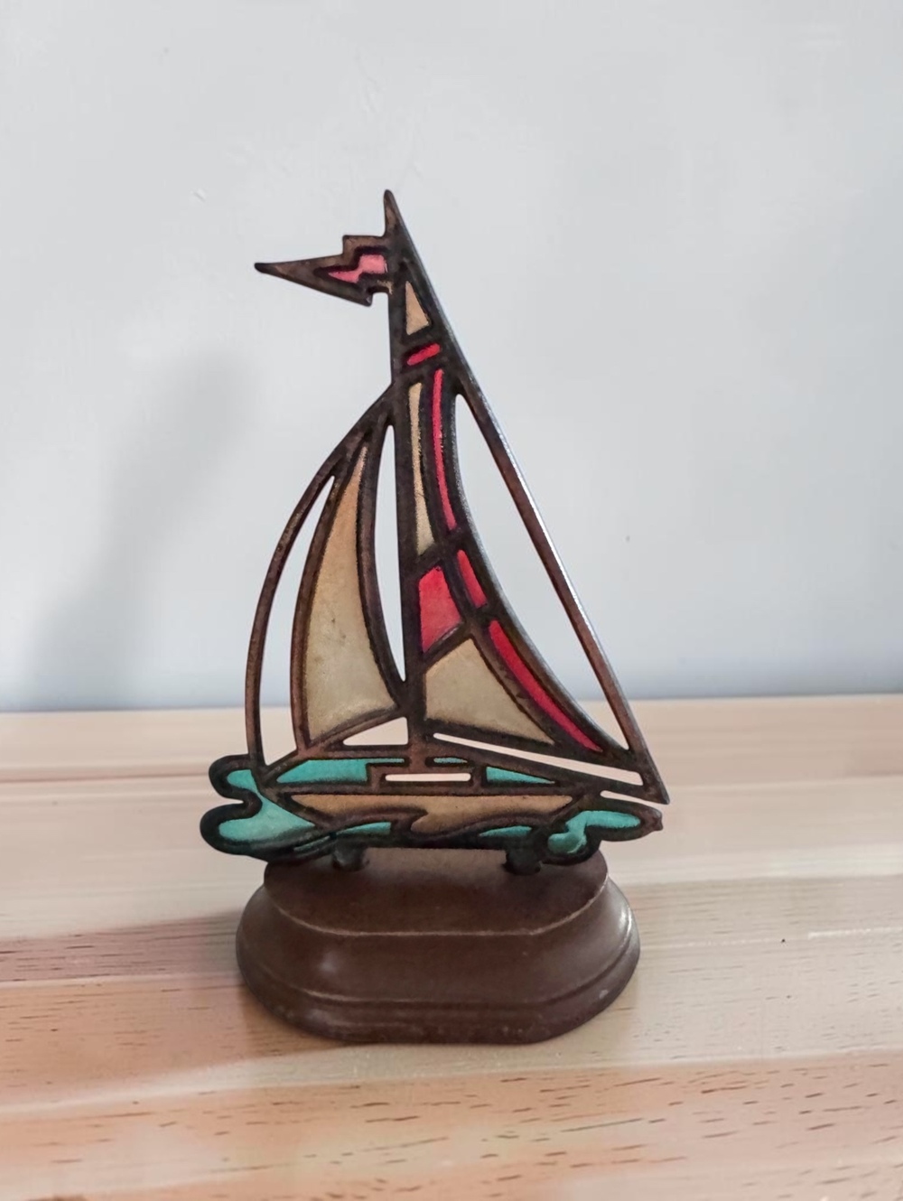 Vintage stained glass sailboat on wood base